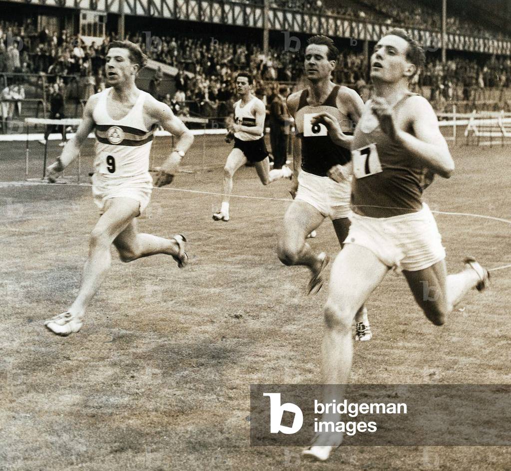 Athlete Mike Hildrey winning heat 2 in the 120 yds invitation, August 1967 (b/w photo)