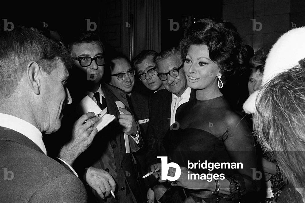 Sophia Loren and Charlie Chaplin (not shown) - November 1965
at a press conference