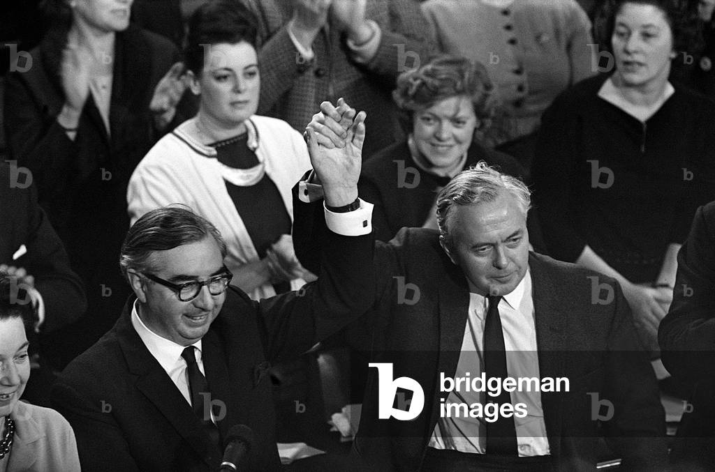Harold Wilson and George Brown hold hands aloft at the end of the conference 1963