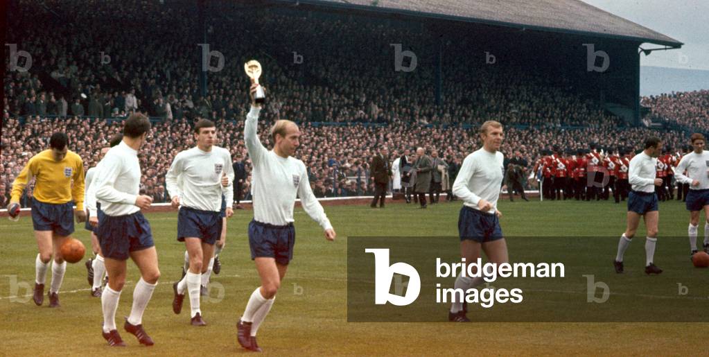 International match in BelfastNorthern Ireland 0 v England 2Bobby Charlton holds aloft the Jules Rimet World Cup trophy to the crowd in their first match since becoming world championsOctober 1966 (photo)