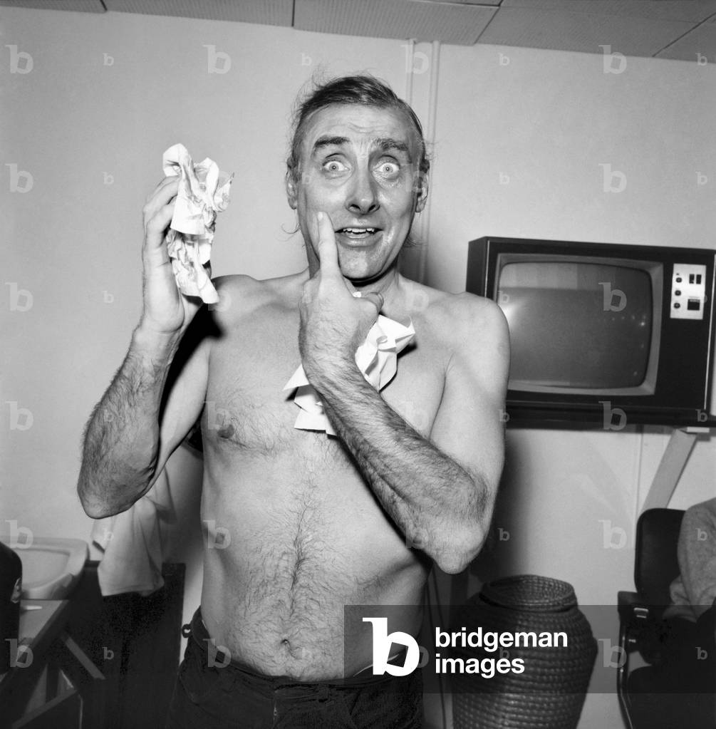 Spike Milligan making up for his part in his new TV series as a Pakistani. The series, written by Johnny Speight, is called 