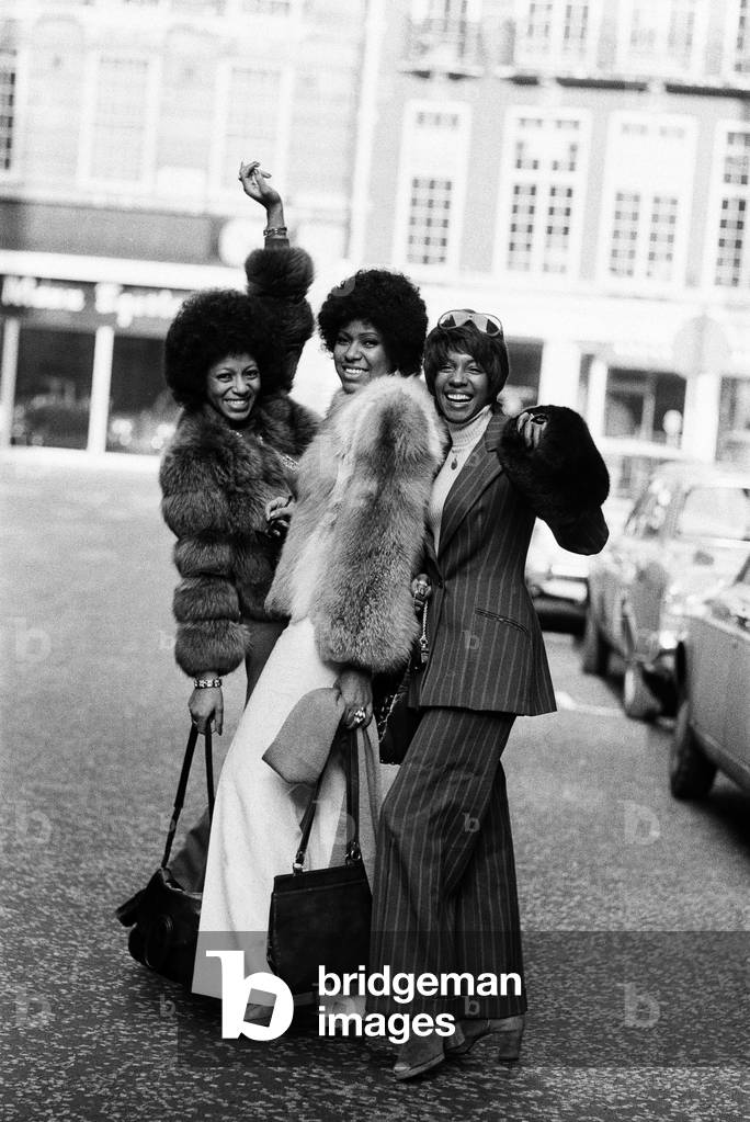 The Supremes, left to right, Lynda Lawrence, Jean Terrell and Mary Wilson, outside the Mayfair Hotel. 11th March 1973 (b/w photo)