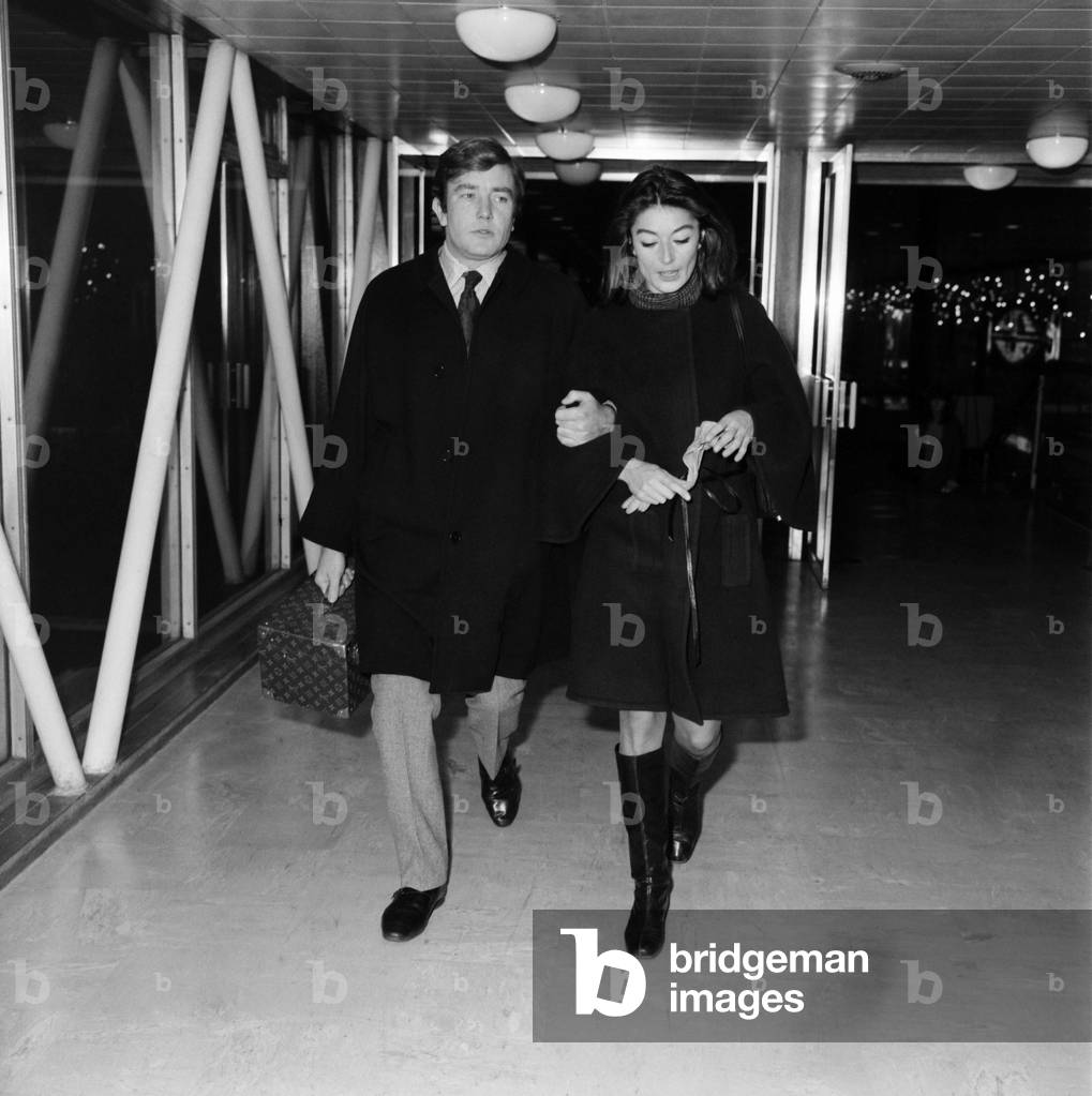 English actor Albert Finney at London's Heathrow Airport Sat 7.12.1968 seeing off French actress Anouk Aime before she flew to Los Angles to finish filming 