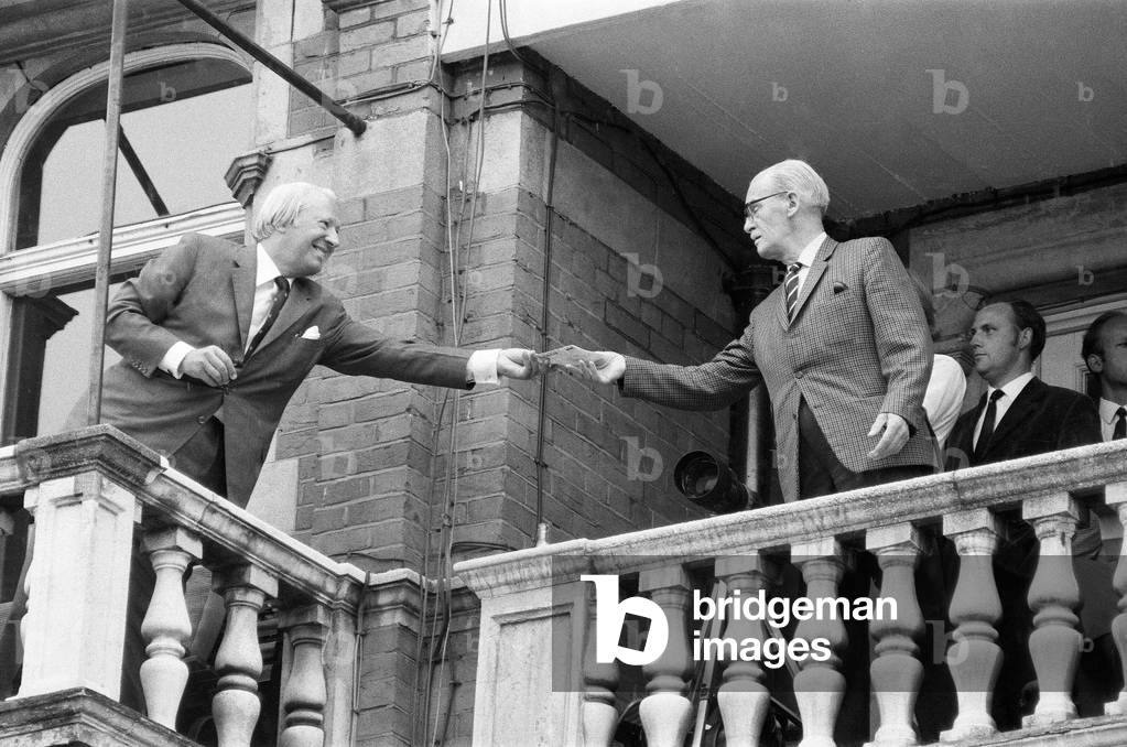 Australian tour of Great Britain for the Ashes. England v Australia Fifth test at the Oval. Prime Minister Edward Heath signs autographs for fans during a break in play. 12th August 1972 (b/w photo)