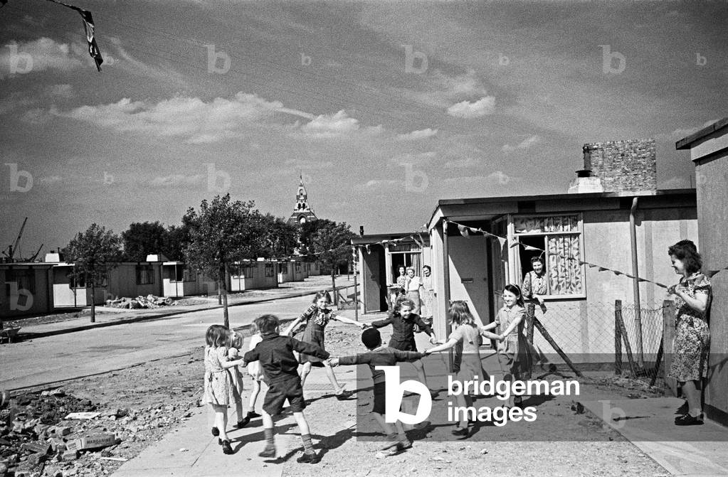 Dockland Houses, Isle of Dogs. Families set up home in pre-fabricated houses, c. 1946 (b/w photo)