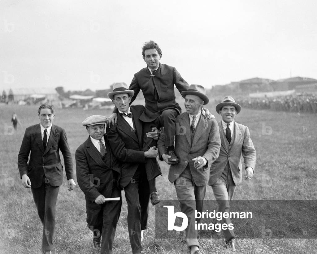 Mr Jimmy James, winner of the Aerial Derby at Hendon being chaired, 8th August 1922