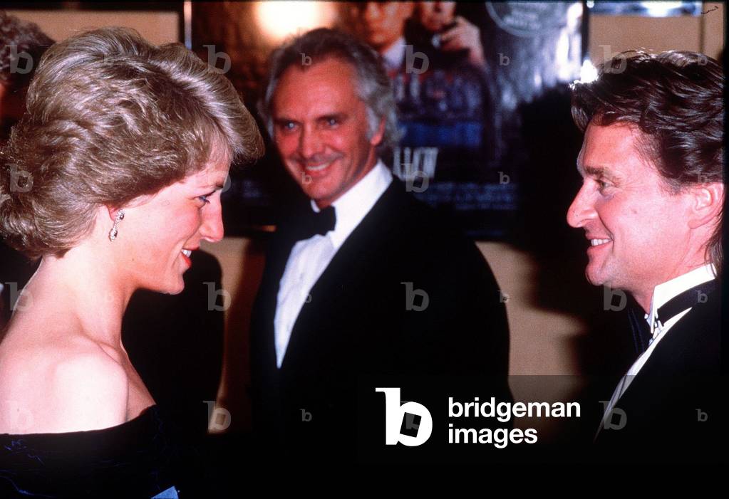 Princess Diana attends the premiere of the film Wall Street. Pictured here meeting Michael Douglas
April 1988