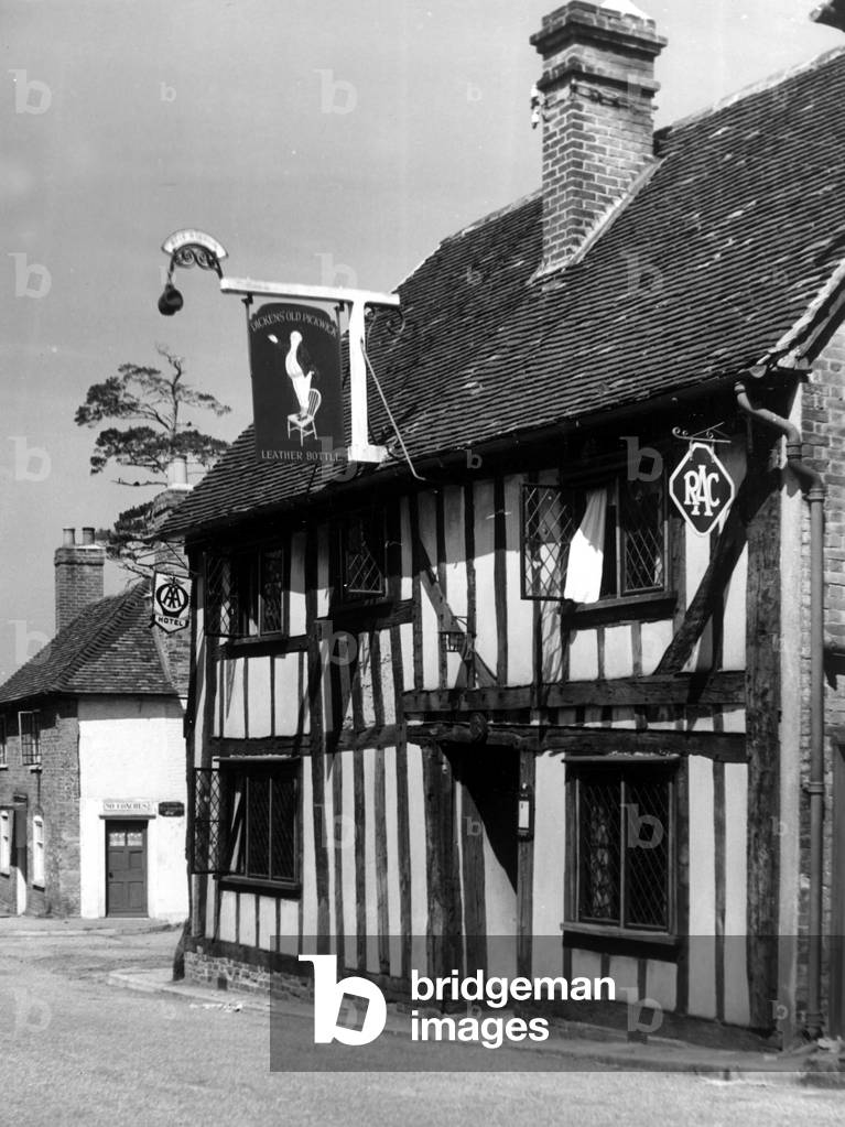 A tudor timber framed public house in the village of Leather Bottle, Kent
 Circa 1935