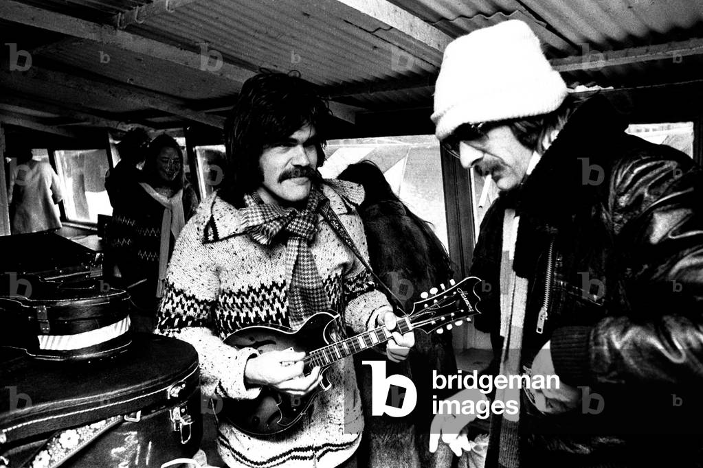 Lindisfarne sailed down the Tyne on a musical journey. The group were filming on board a Tyne ferry for a half-hour television show called 'All Right Now'. 4th March, 1979 (b/w photo)
