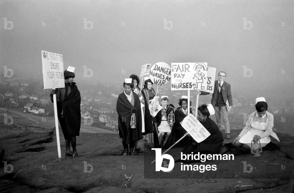 Nurses campaigned for more pay near Ilkley when they marched from the town centre to the Cow & Calf Rocks high on the Ilkley moors where they intend to camp. Pictures show the nurses on their way to the Cow and Calf Rocks
December 1969