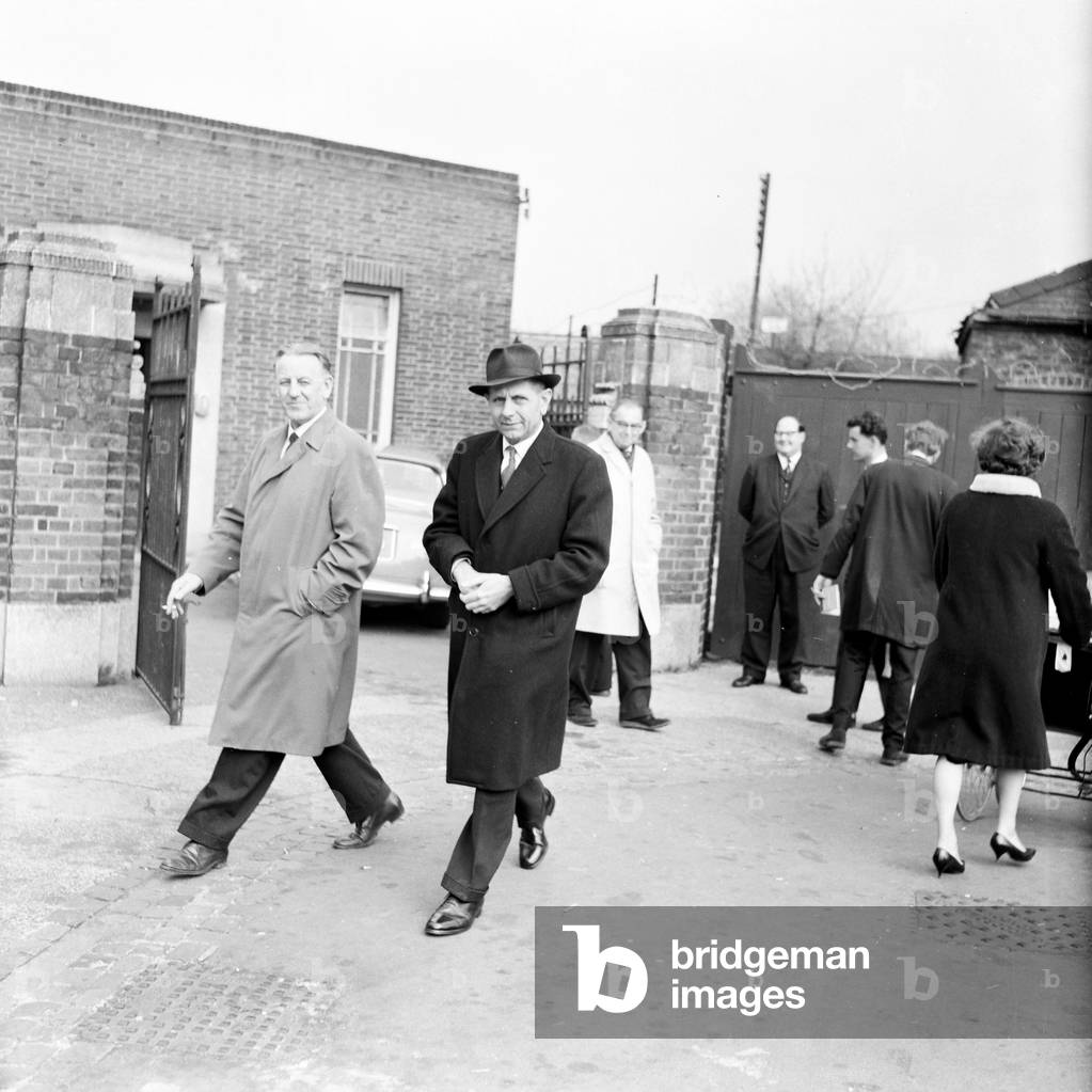 Detectives arrive in Brentford to investigate the death of Helen Barthelemy, whose body was found earlier today 24th April 1964 (b/w photo)