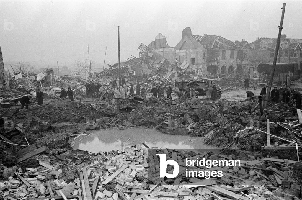 V2 Rocket incident at Chingford Road, Walthamstow. Remains of a surface shelter in which 8 people were killed and many more casualties in surrounding houses. 8th February 1945 (b/w photo)