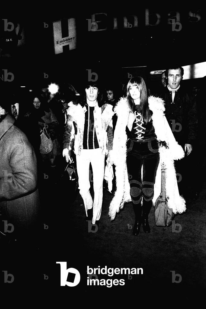 Rolling Stones: Bill Wyman & his girlfriend Astrid arrive at Newcastle Central Station, 1971