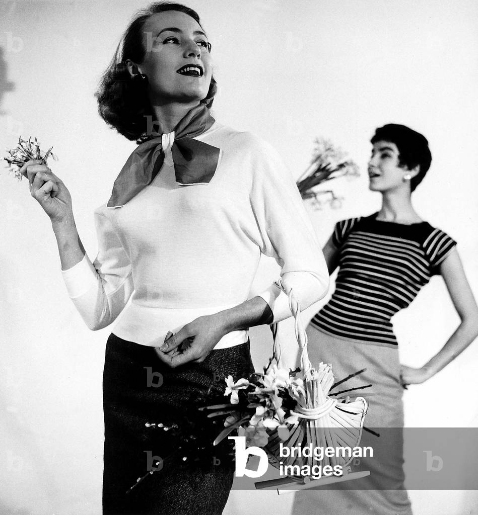 Jean Dawney showing the latest fashion clothing in the 1950s, February 1955 (b/w photo)