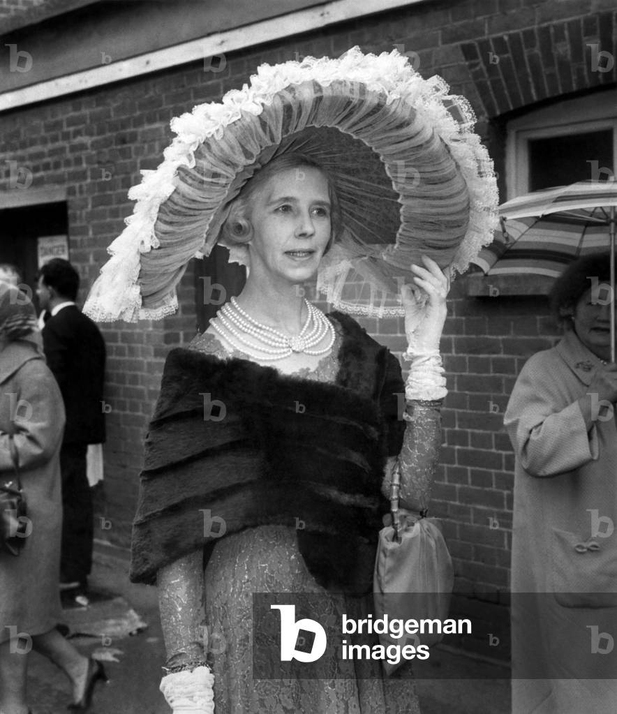 Clothing. Fashion: Ascot Hats. Mrs. James Elliott of Lincolnshire, wearing a very large hat in French lace and net. June 1965 (b/w photo)