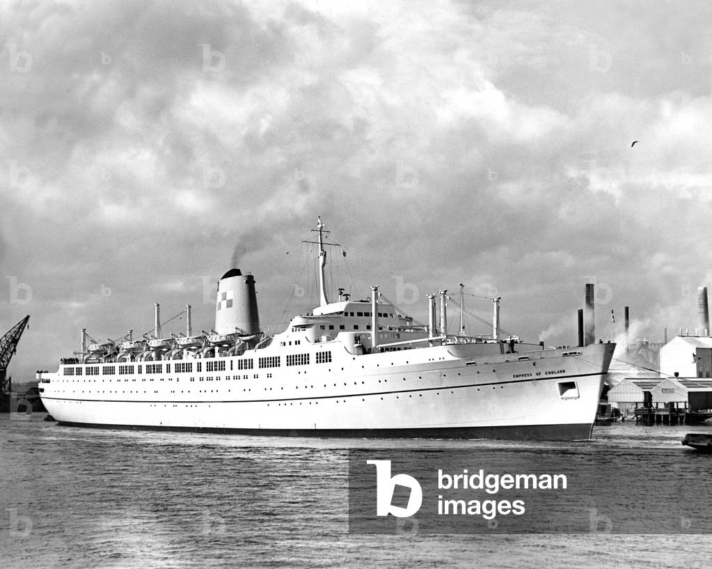 Under her own steam the new liner Empress of England ship (now called Ocean Monarch 1970) makes her way up the River Tyne, c. 1950