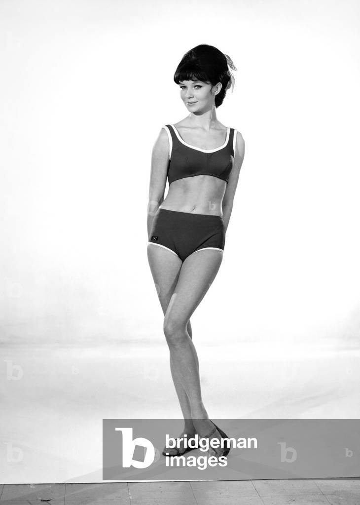 Clothing: Fashion: Beachwear: Model Meriel Weston seen here modelling swimming costumes. January 1965 (b/w photo)