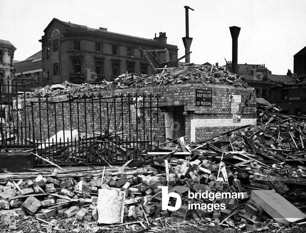 Bomb damage in Liverpool during the Second World War. A street surface shelter which withstood the strain of a tall building which fell upon it during the weekend raids., 2nd September 1940 (b/w photo)