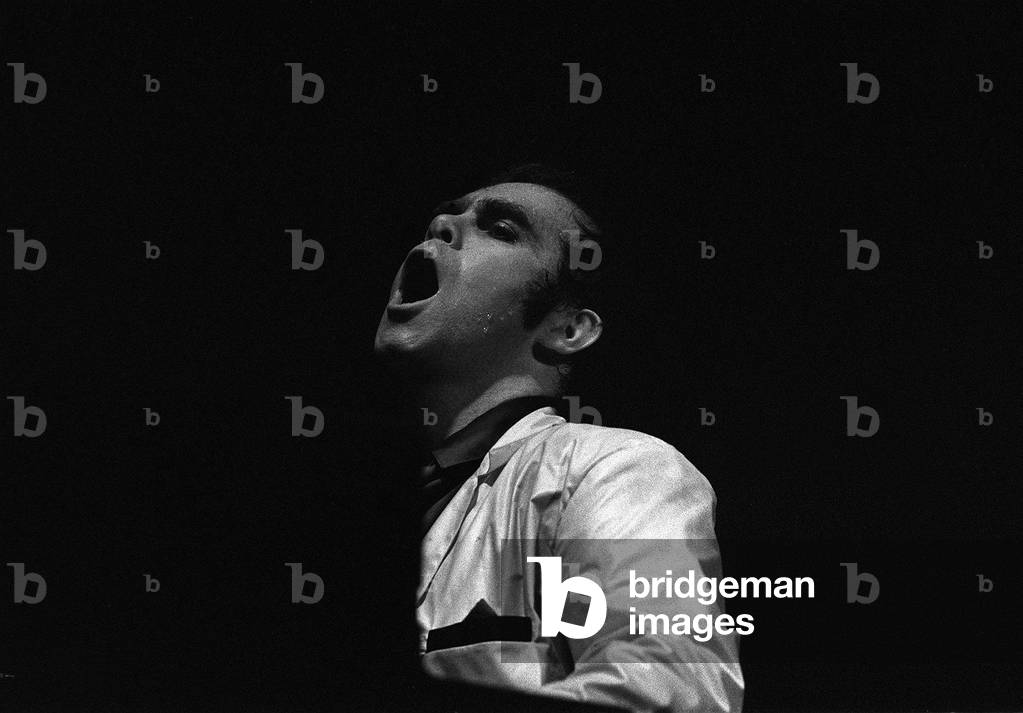 Rock superstar Sir Elton John in concert at the Palladium Theatre, Greenwich Village, New York during his American tour, 26 October 1979 (b/w photo)