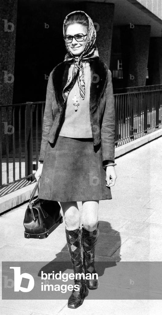English fashion model April Ashley leaves court after her husband Hon Arthur Corbett had the marriage annulled, 4th May 1970 (b/w photo)