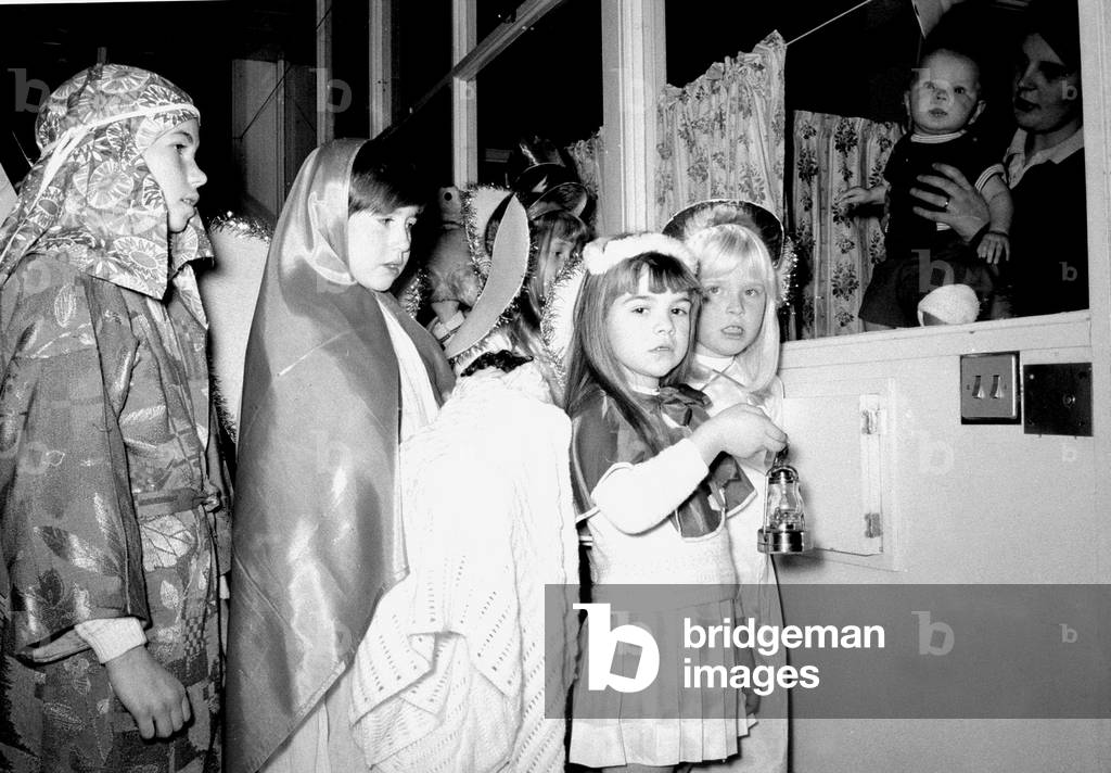 Children singing carols, December 1969