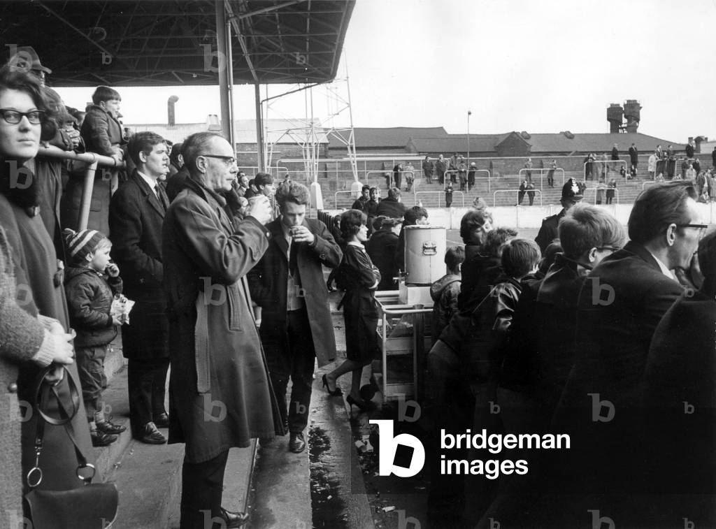 Rotherham Football Club. Supporters buying tea from an Urn in the stands. 10th March 1966 (photo)