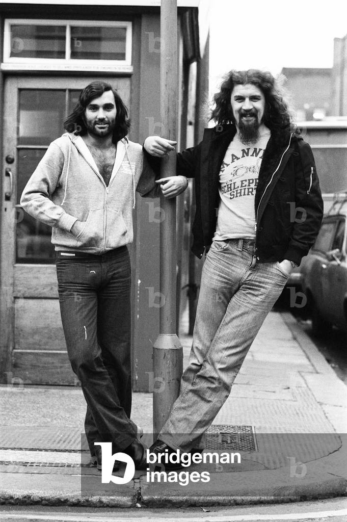 Scottish Comedian and Cabaret star Billy Connolly met George Best in London to discuss the Cabaret for a special dinner being held at the Grovenor Hotel, London on February 6th 1977 in aid of the George Best benefit Committee. The Cabaret will inclue Peter Cook, Jimmy Tarbuck Billy Connolly and Michael Parkinson. 20th January 1977 (b/w photo)