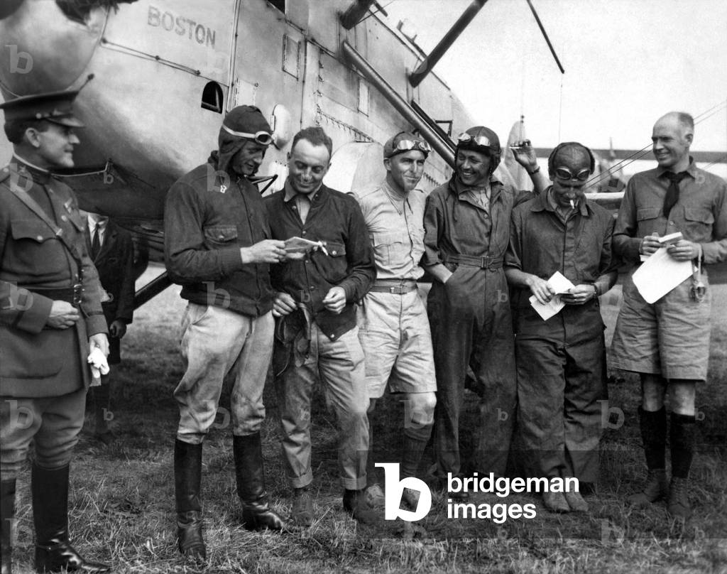 Four Douglas World Cruisers, modified torpedo bombers, named after the cities of Seattle, Chicago, Boston and New Orleans took off from Lake Washington, Seattle on 6th April 1924 and headed West to fly around-the-world. Seattle was lost when it hit a mountain in Alaska. 

Pictured here is Boston with Lt Lowell H Smith the leader and crew when they arrived at Croydon on 17th July 1924; later it force-landed in the Atlantic, with the remaining two arriving back in Seattle on 28th September after their 27,534 mile flight over 28 countries.

USA Round the World Flight Attempt 1924