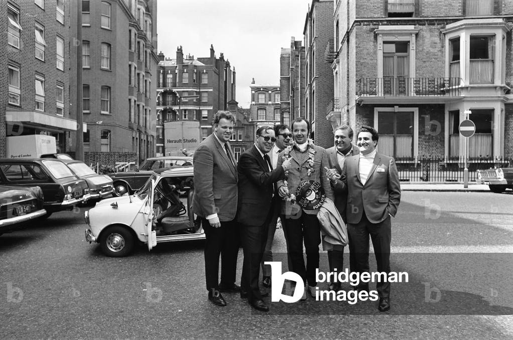 American rock and roll singer Bill Haley with his band The Comets in London shortly before their appearance at the Royal Albert Hall. 28th April 1968 (b/w photo)