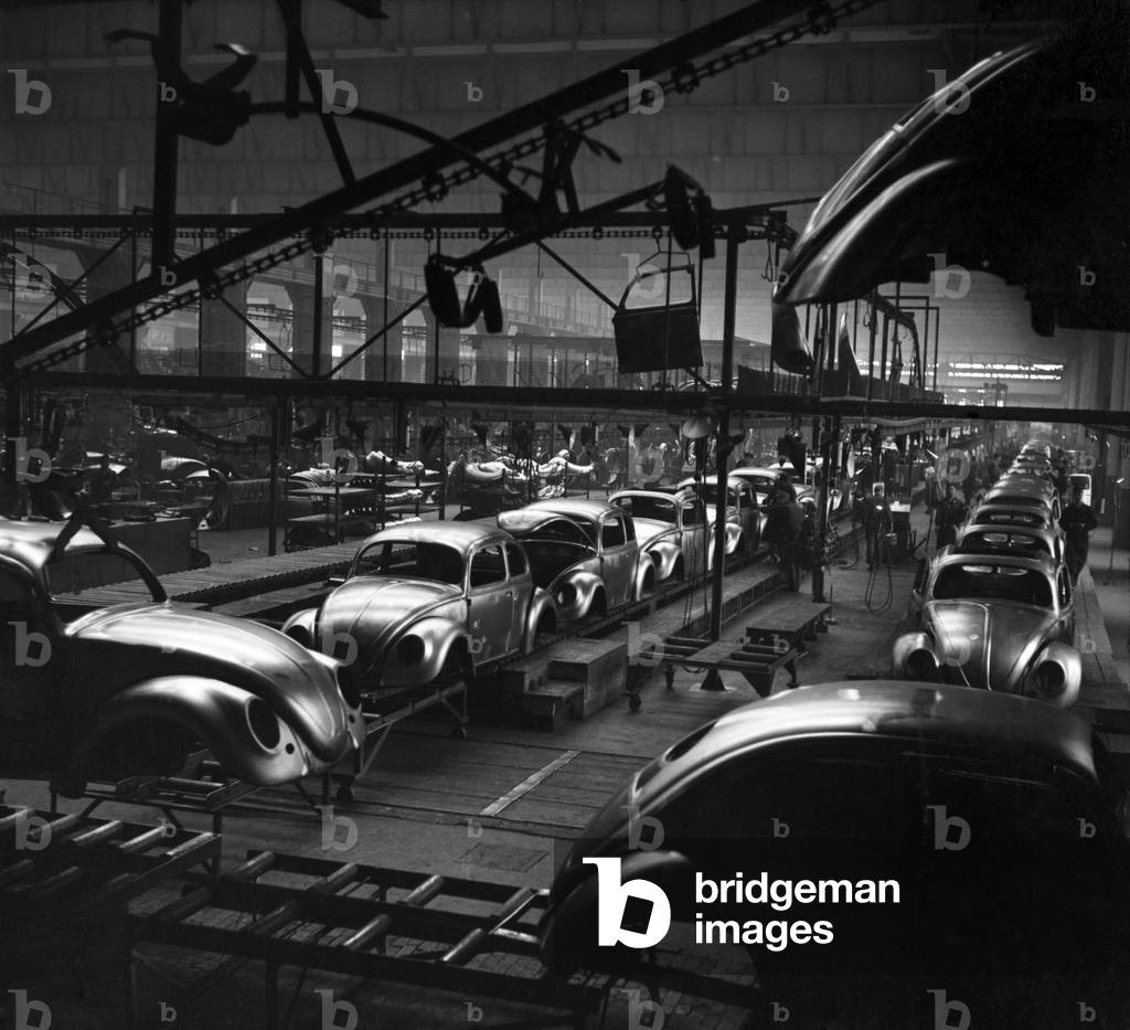 General views of the production line at the volkswagen factory producing Beetle cars in Germany. December 1952 C6101-002