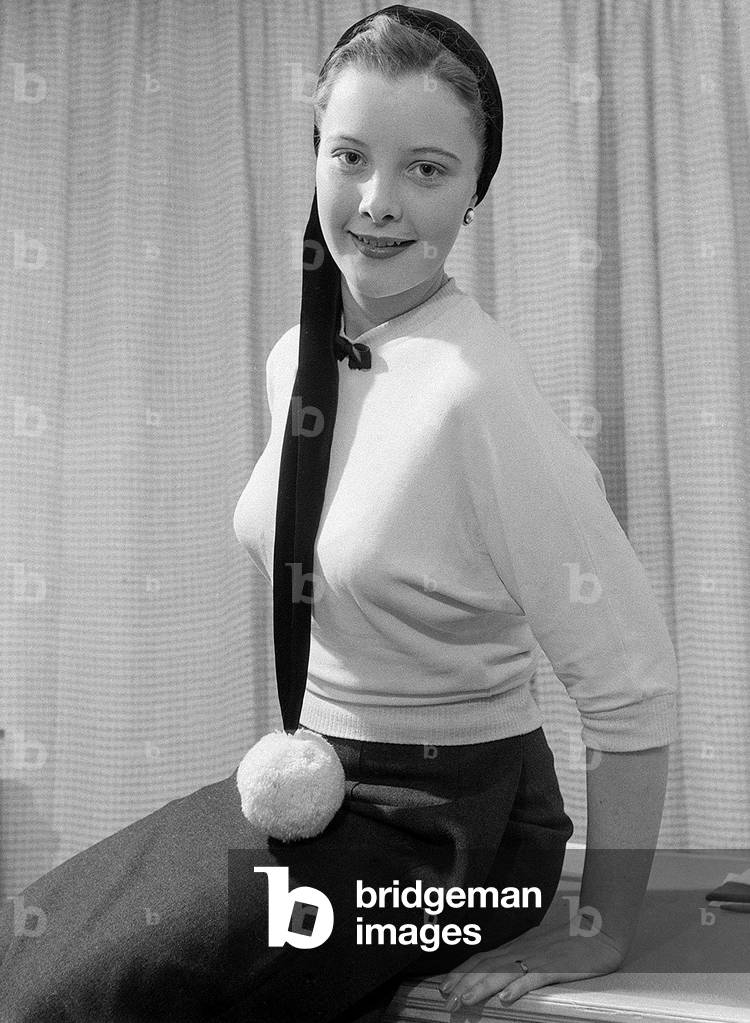 Film star June Thorburn receiving beauty treatment at Atkinsons salon on Bond Street in London December 1952 (b/w photo)