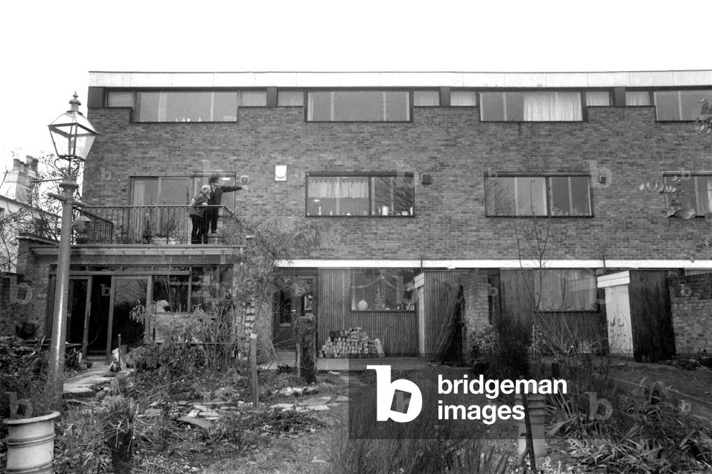 Singer Rolf Harris who lives in Sydenham, Kent, has bought the house adjoining his own modern terrace. He decided he would like to enlarge the three bedroomed house and knocked down the brick wall between the houses, himself. Rolf and his sculptress wife Alwen live their with their five year old daughter Bindi. 
December 1969