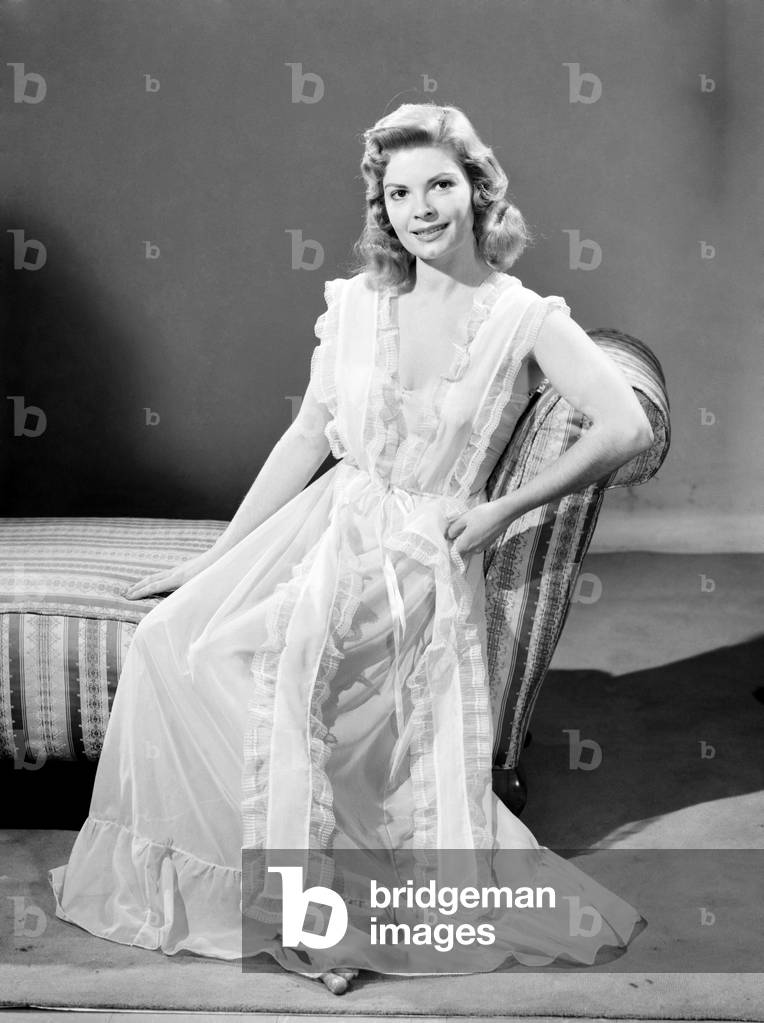 Model wearing night dress, 1953 (b/w photo)