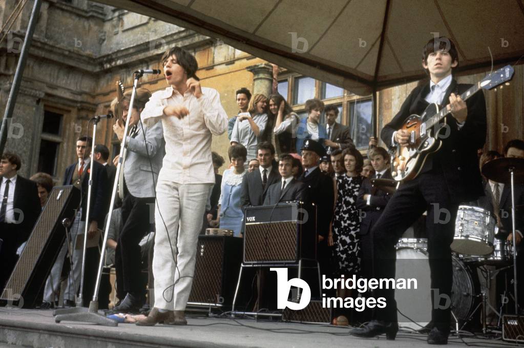 Rolling Stones on stage at Longleat House in Wiltshire, 2nd August 1964.
Singing is Mick Jagger with Keith Richard on guitar.