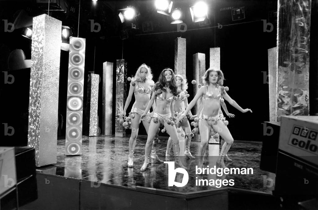 Scenes at BBC studios during the filming of the music television programme Top of the Pops Pans people go through their weekly routine of dancing to a hit record, 17th April 1975 (b/w photo)