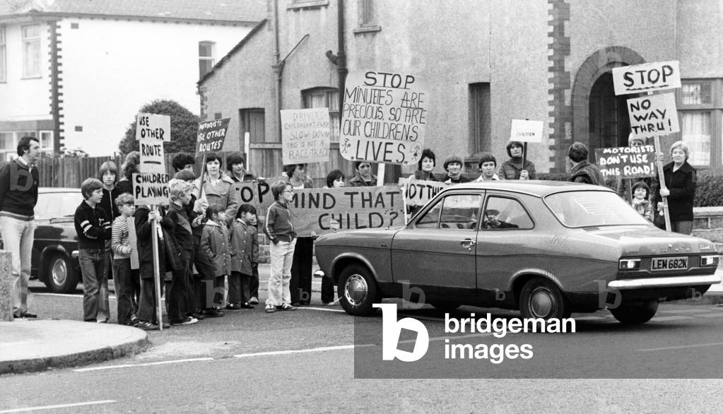 Residents of two Tuebrook, Liverpool, roads set up roadblocks to-day in a plea to motorists who they say use them 'like a race-track.' And they hope to keep up the demonstrations, till Wednesday, putting the message across to all drivers who regularly use the roads Richland Road and Rockbank Road, as short cuts to dodge traffic lights. 14th October 1978 (b/w photo)