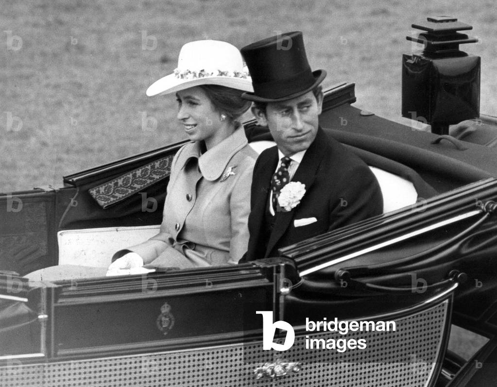 Prince Charles, Prince of Wales with his sister Princess Anne drive down the course at Royal Ascot, 21st June 1972