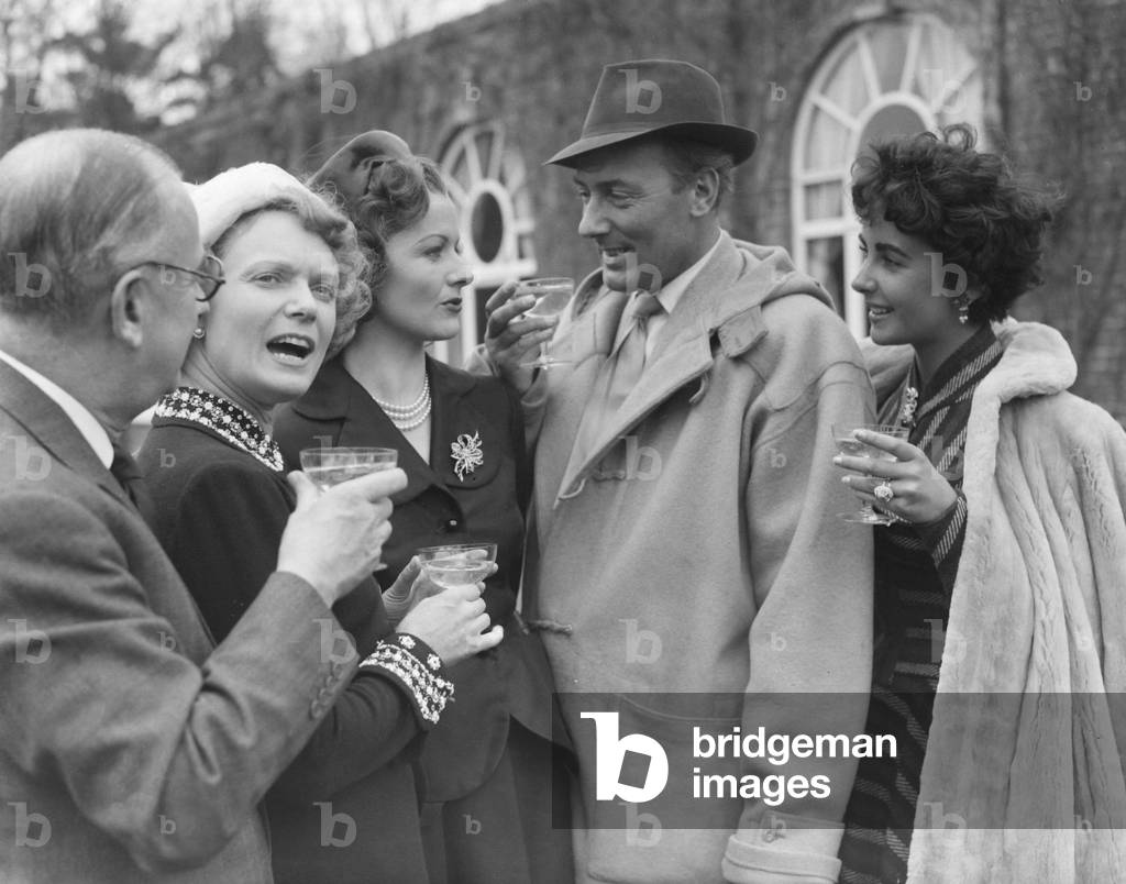 Michael Wilding, Elizabeth Taylor, Margaret Lockwood and Anna Neagle, 4/3/1952 (b/w photo)