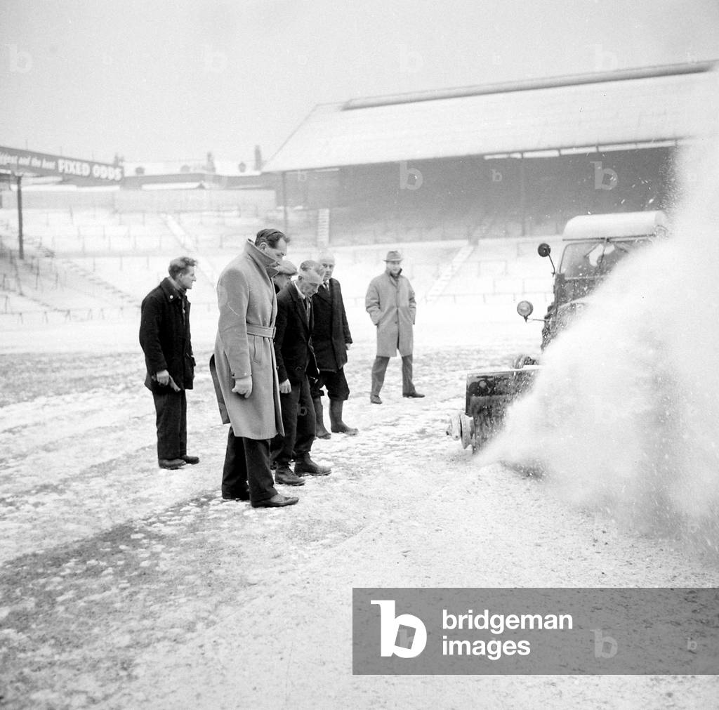 Pitch Inspection. Birmingham grounds staff seen here clearing snow from the pitch. January 1963 (photo)