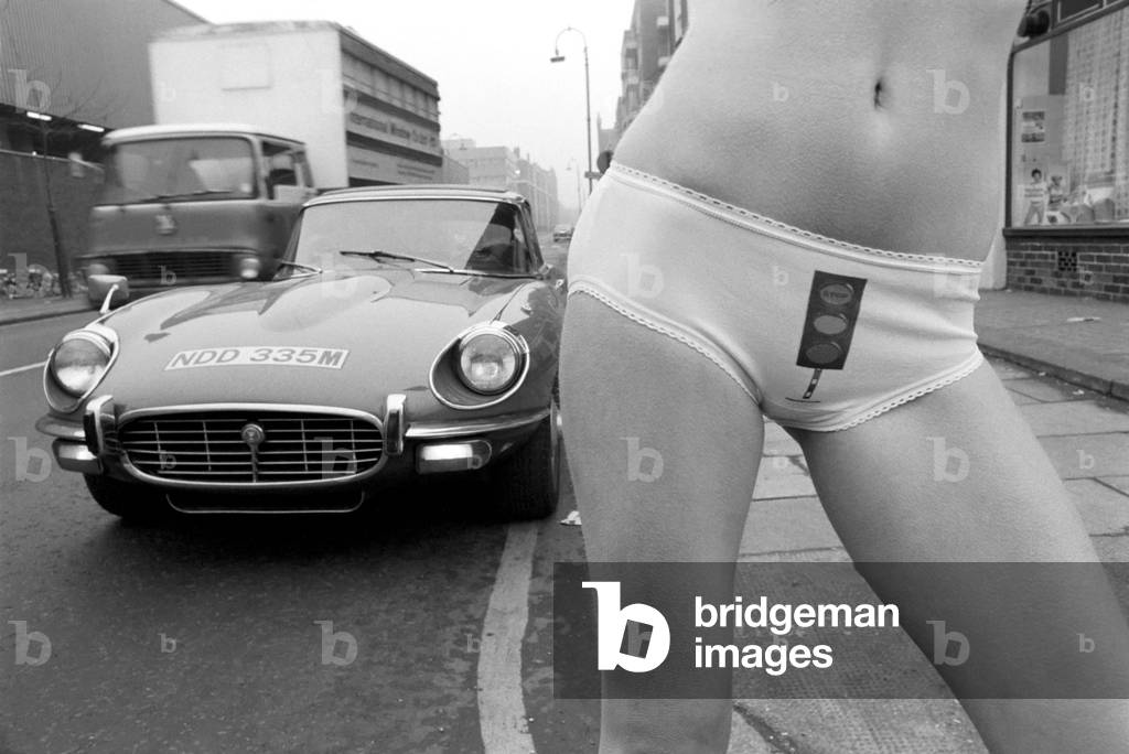 Model Carolyn Wright seen here on the streets of London modelling the 1975 Summer and Autumn Sunarama underwear collection February 1975