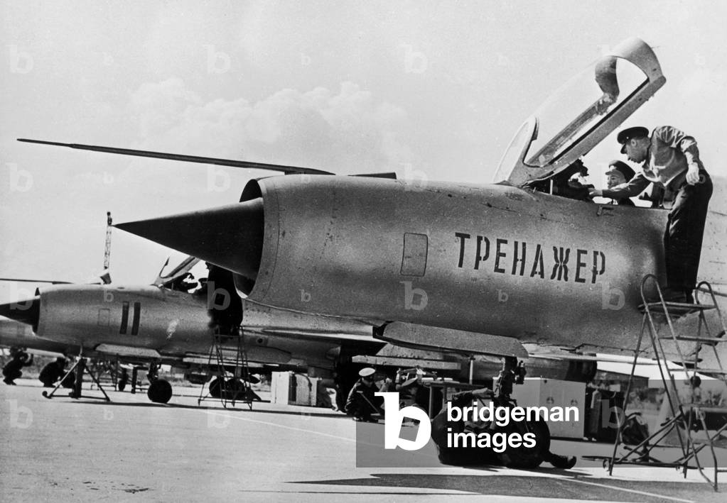 Vietnamese cadet pilots seen here during their training on the MiG-21PFL (Nato codename Fishbed) fighter bomber at a undisclosed airbase on the Russian Steppes. Circa August 1966 (b/w photo)