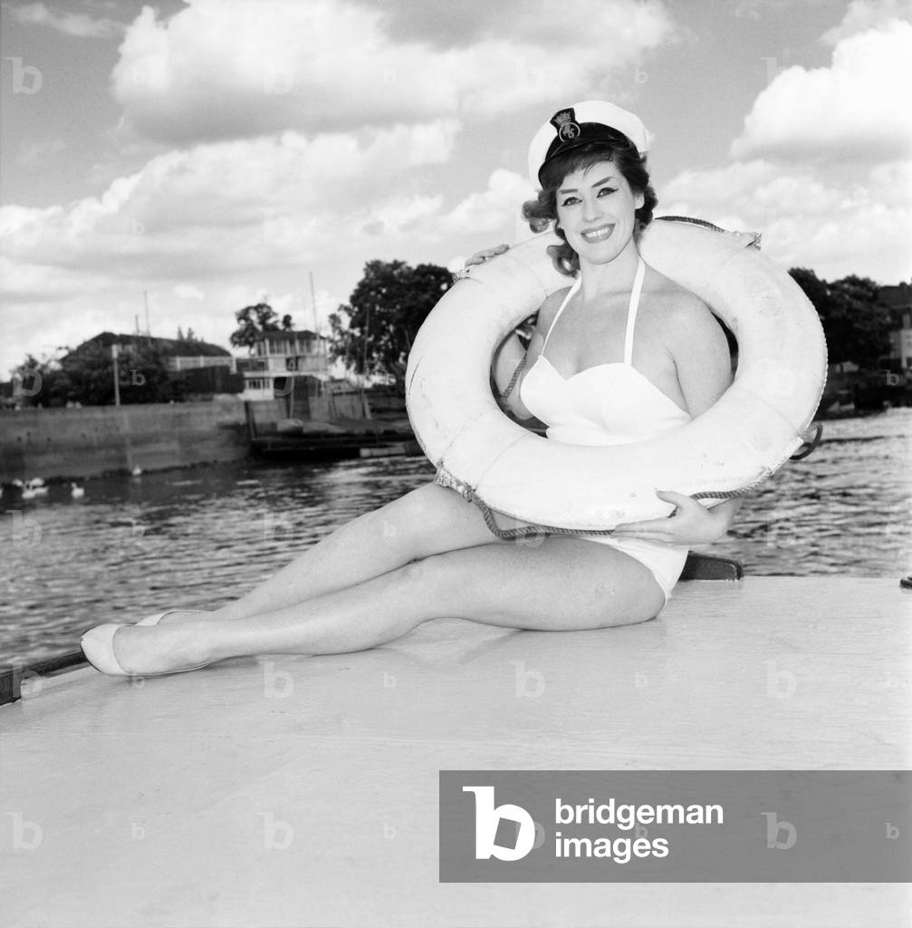 Glamour girl/actress June Barry at Hammersmith Pier. June 1960