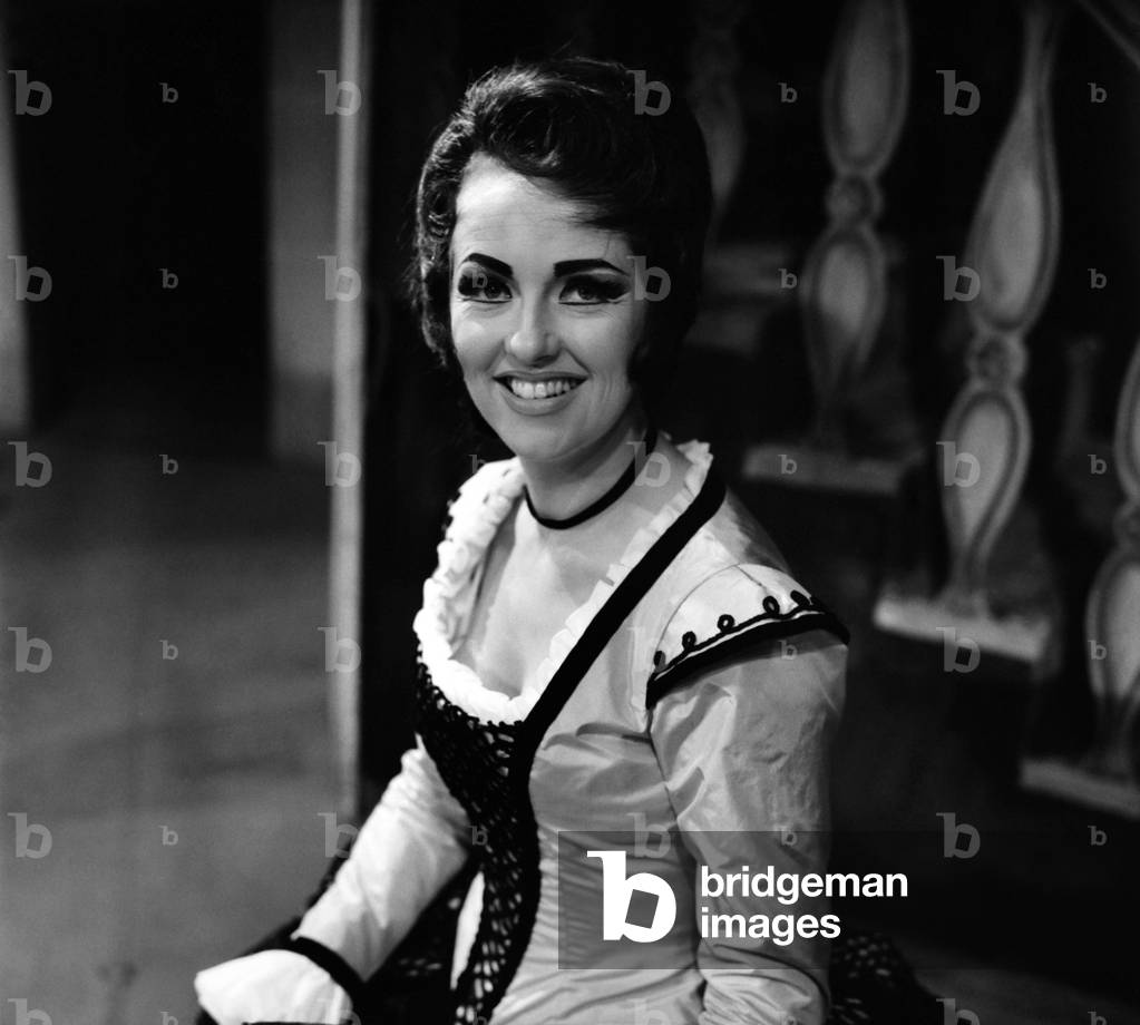 Anne Howells (28) from Sale, Cheshire who is a member of the Royal Covent Garden Opera Company is to make her debut in the leading role of Rosina in the Barber of Seville. The conductor David Atherton (25) is conducting the opera, this being his first Rosini Opera. Anne Howells in the bride's costume as seen in the Barber of Seville. November 1969