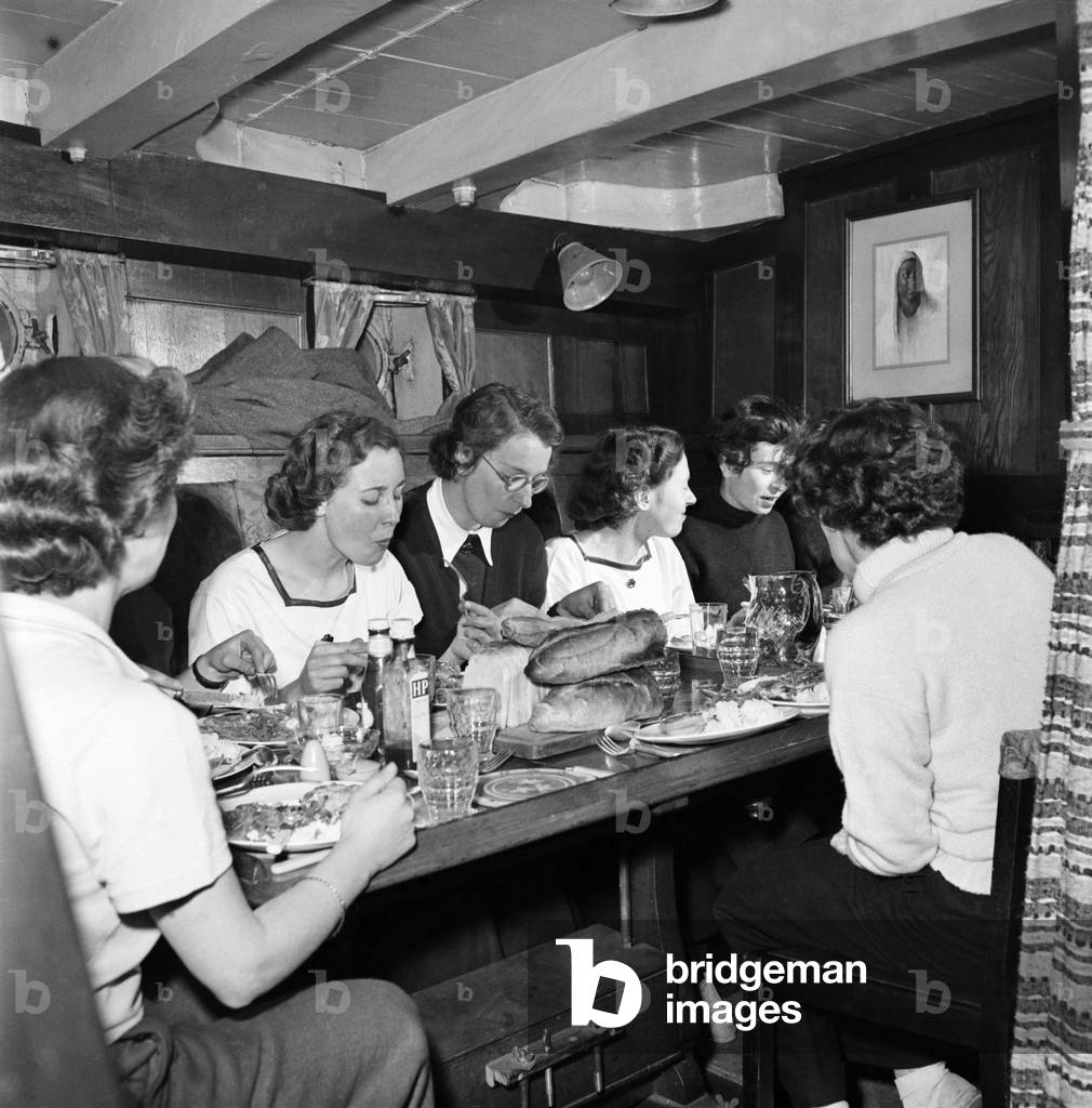 Sailors and cadets of the under 21 sailing club seen here aboard the Brixham fishing trawler Terminist. October 1952 C4799-