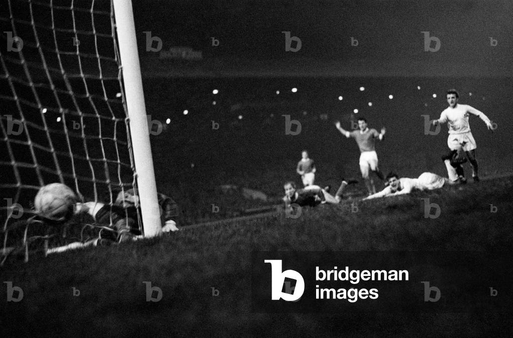 Bobby Charlton, lying on the ground, European Cup Winners, Old Trafford, 1963 (b/w photo)