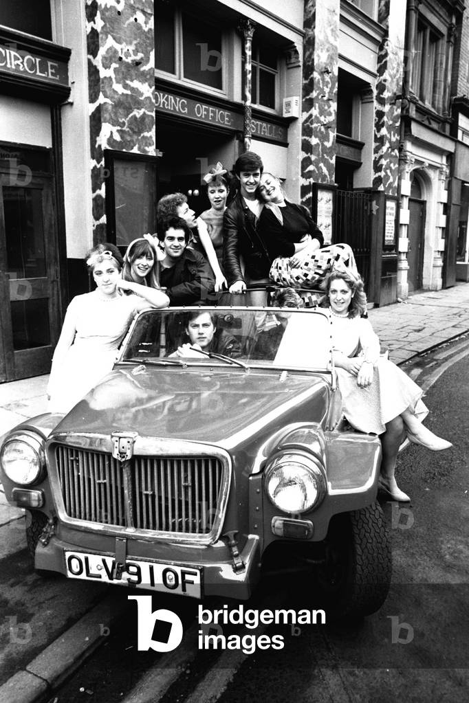 Newcastle University students on a photo call outside the New Tyne Theatre, Westgate Road, Newcastle on 29th February 1984 (b/w photo)
