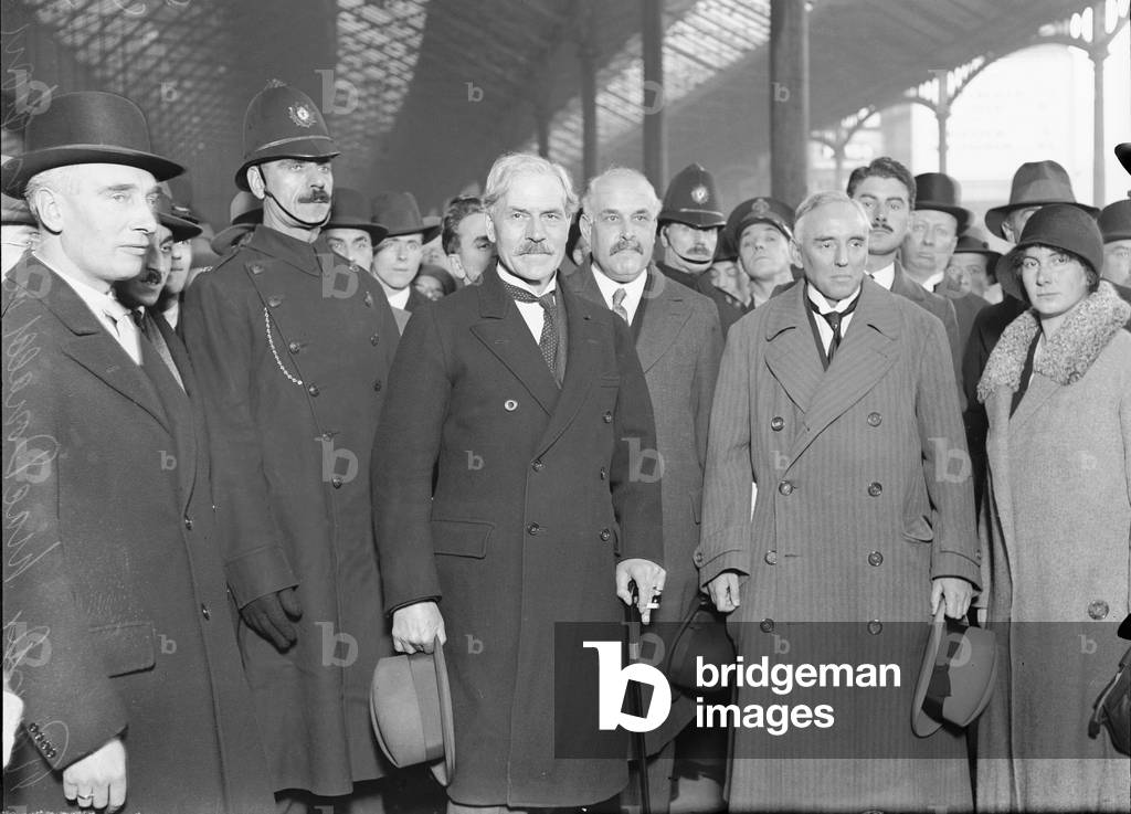 Prime Minister Ramsay MacDonald (centre) seen here with Sir Stamp, Lord Arnold and Ishbel McDonald on his return from the United States of America 3rd May 1933 (b/w photo)