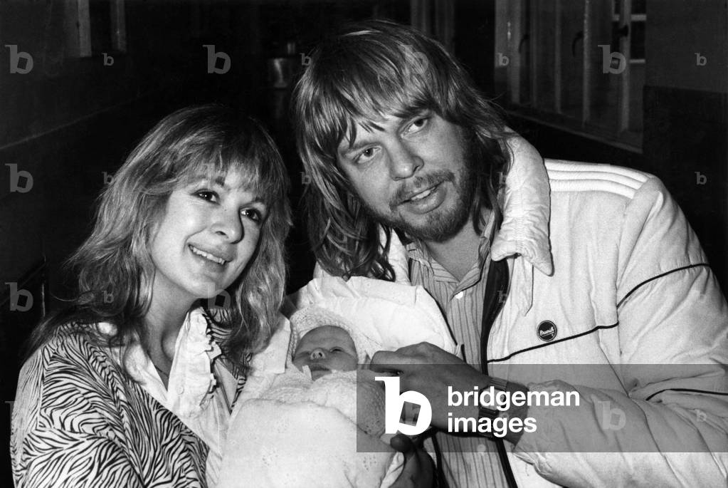 This is the moment that pop star Rick Wakeman and former Page Three pin up Nina Carter have been waiting for. They proudly show off their 9 day old daughter Gemma, the child they have both waited a long time, March 1983 (b/w photo)