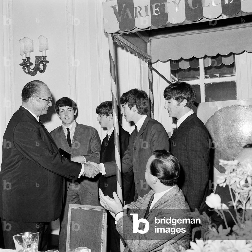 The Beatles attend the Variety Club Lunch.
Left to right: Paul McCartney, Ringo Starr, George Harrison and John Lennon.
10th September 1963.