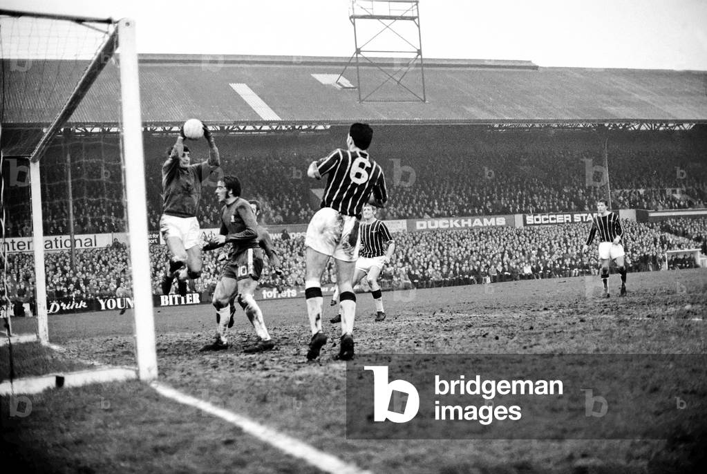 English League Division One Match. Crystal Palace v. Chelsea. Jackson the Palace goalie gathers the ball from Hutchinson of Chelsea No. 10 as Hynd No. 6 of Palace looks on. December 1969 (photo)